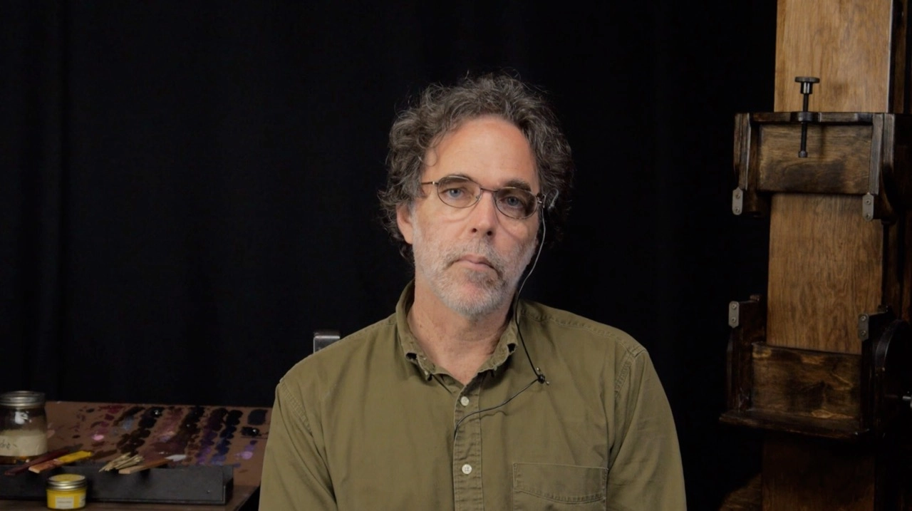 Mark Carder of Draw Mix Paint demonstrating open palette color mixing techniques in his studio