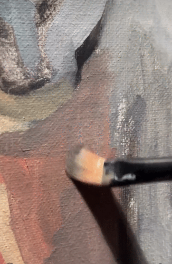 Hairless Cat painting detail with paintbrush in frame